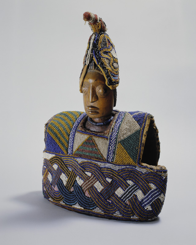 Male Twin Figure with Cloak and Cap (ere ibeji with ewu ileke)